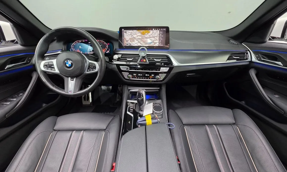 BMW 5-Series — фото 10