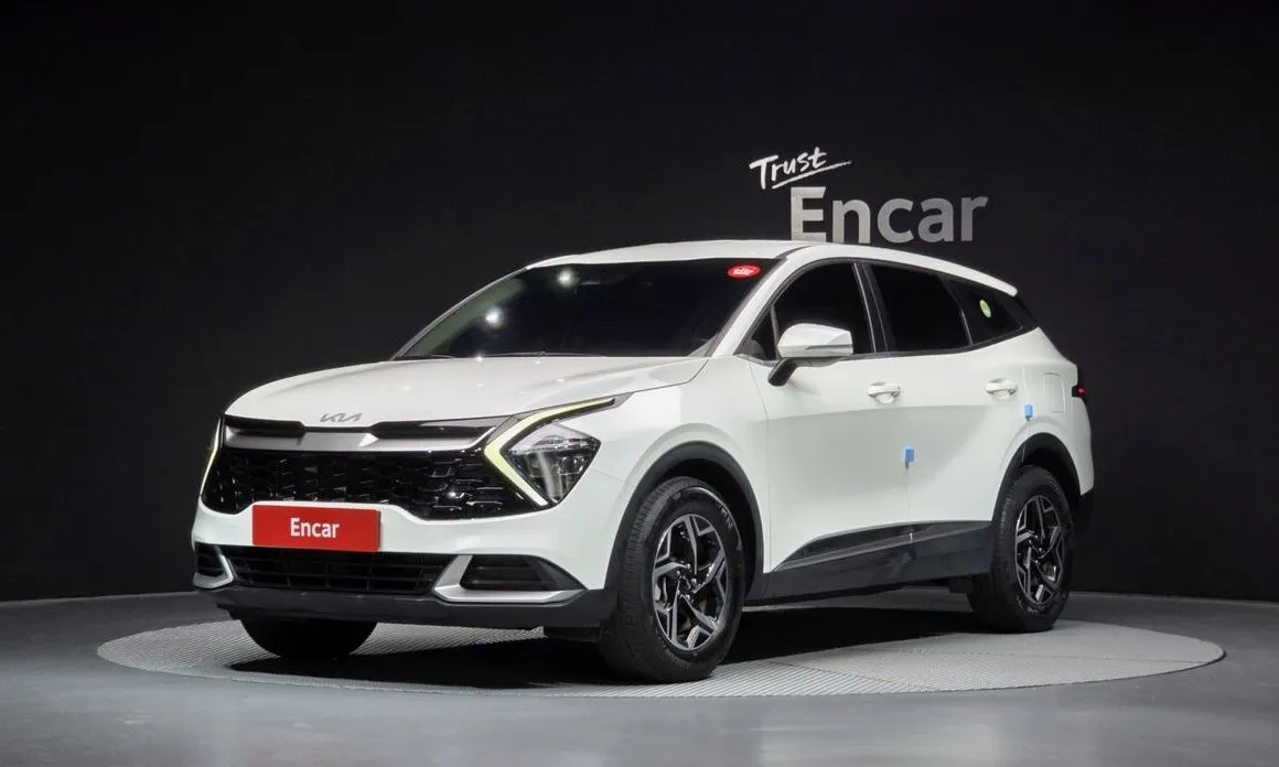 Kia Sportage — фото 1