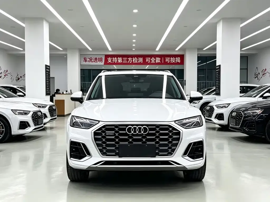 Audi Q5L — фото 10