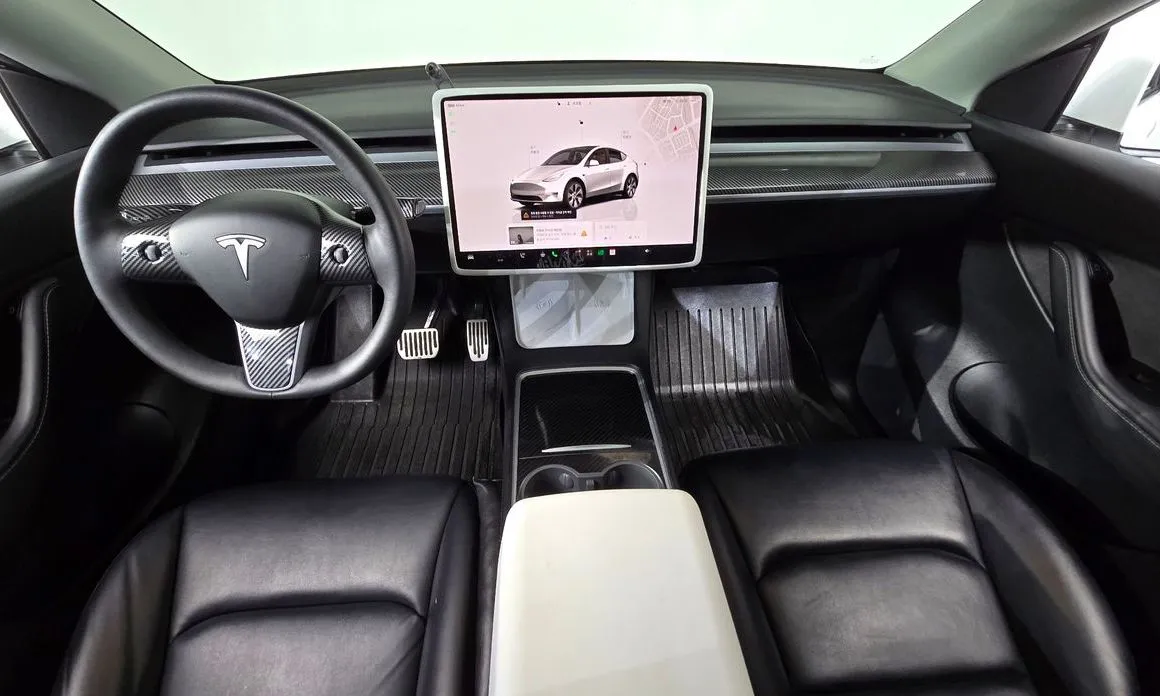 Tesla Model Y — фото 8