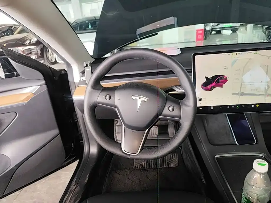 Tesla Model 3 — фото 10