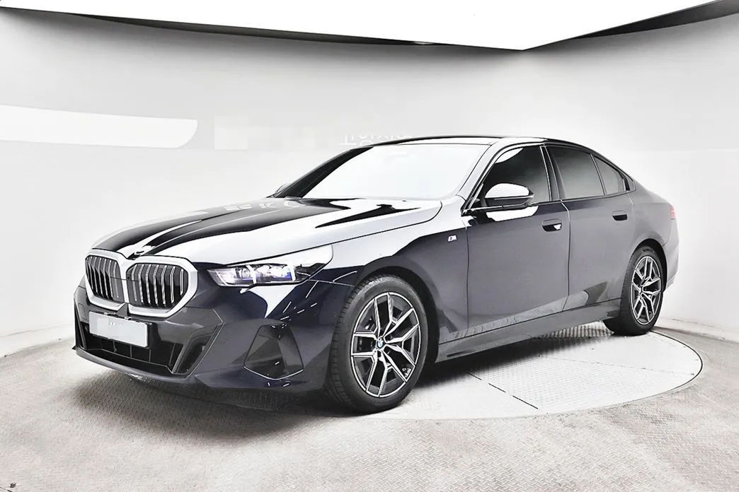 BMW 5-Series — фото 1