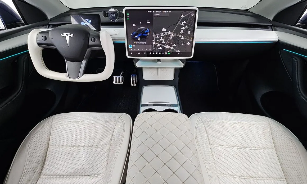 Tesla Model Y — фото 9