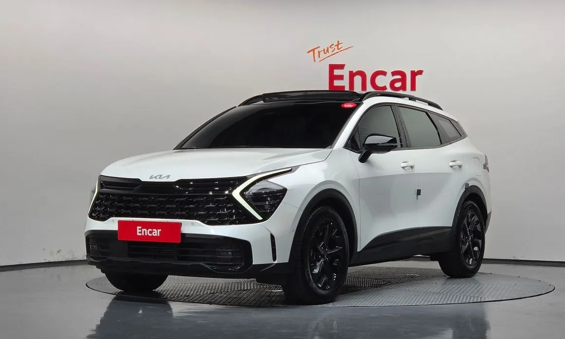 Kia Sportage — фото 1