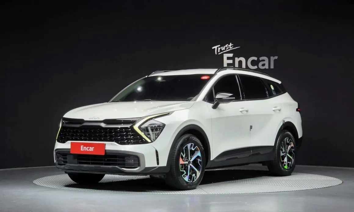 Kia Sportage — фото 1