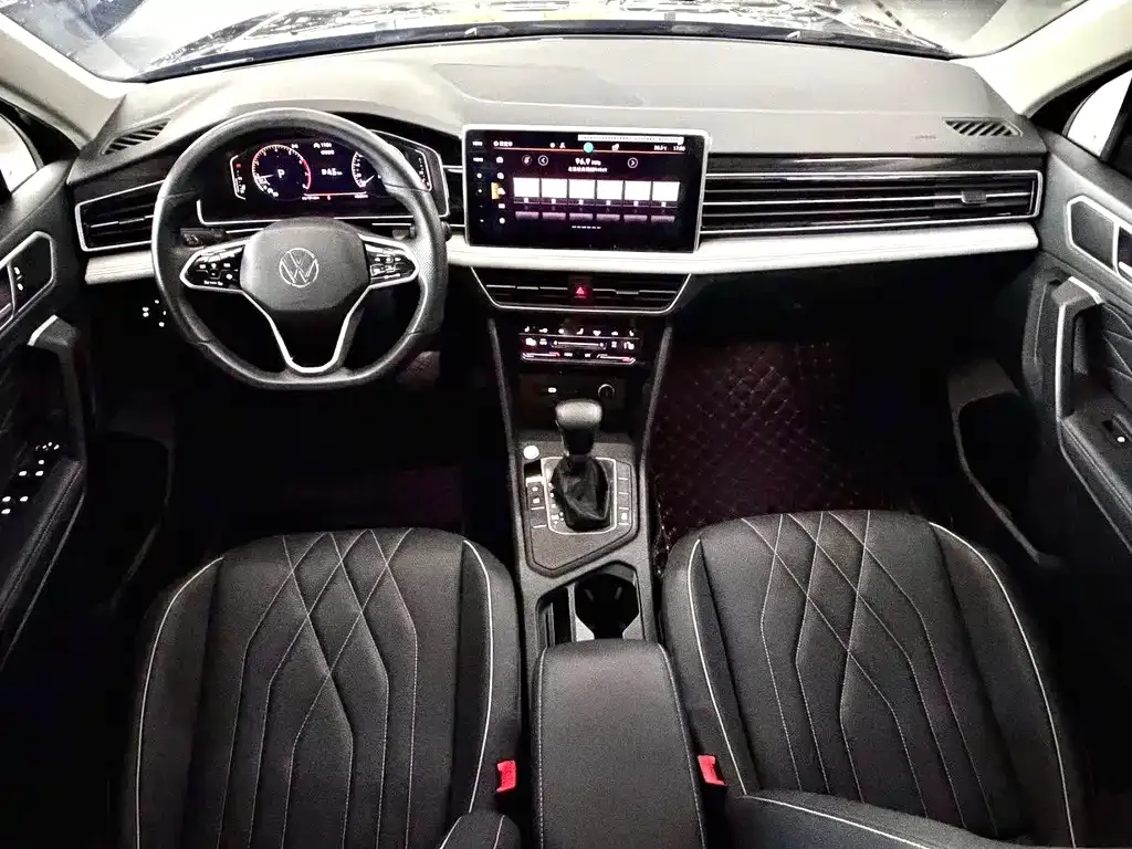 Volkswagen Tiguan L — фото 2