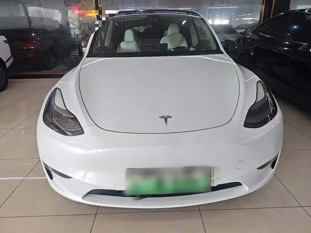 Tesla Model Y — фото 4