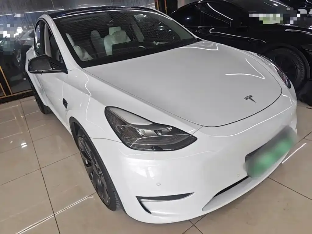 Tesla Model Y — фото 5