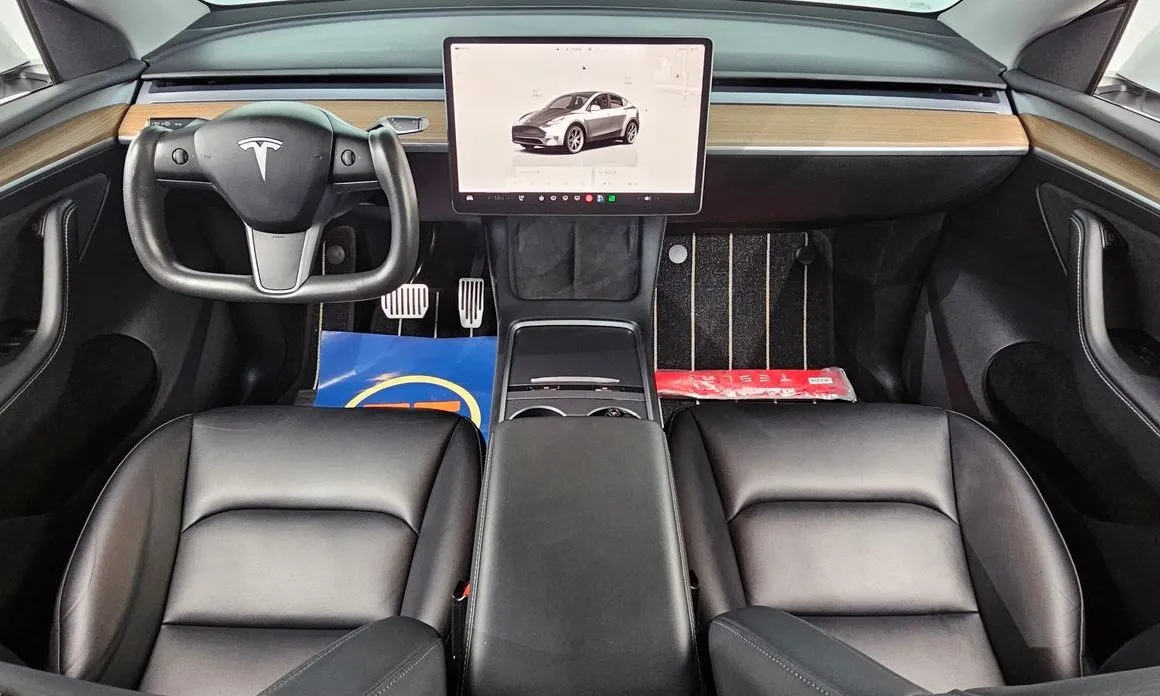 Tesla Model Y — фото 9