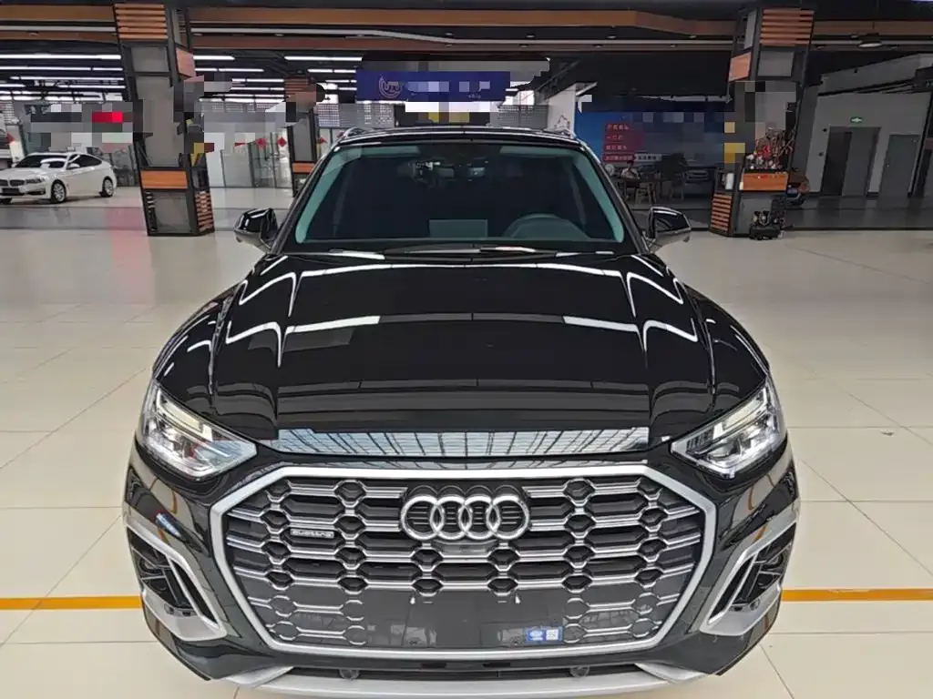 Audi Q5L — фото 7