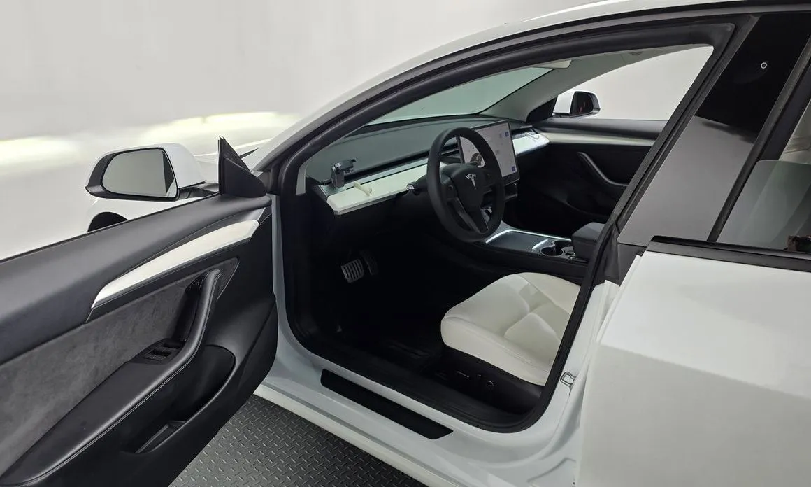 Tesla Model 3 — фото 3