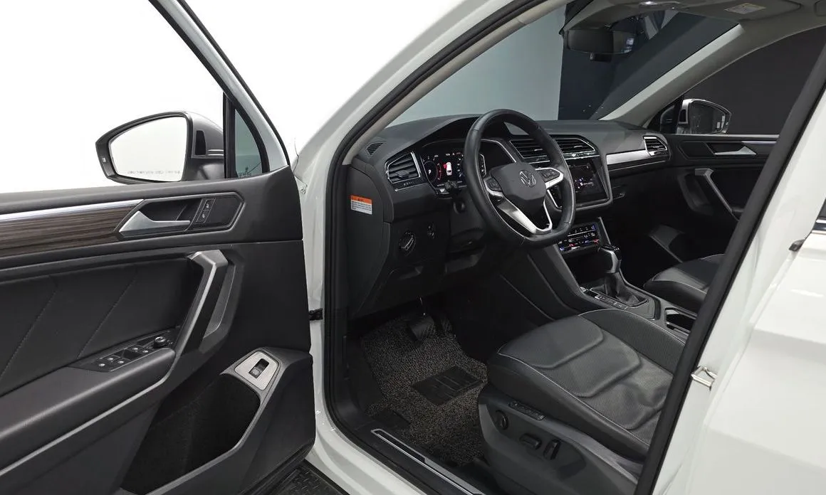 Volkswagen Tiguan — фото 7