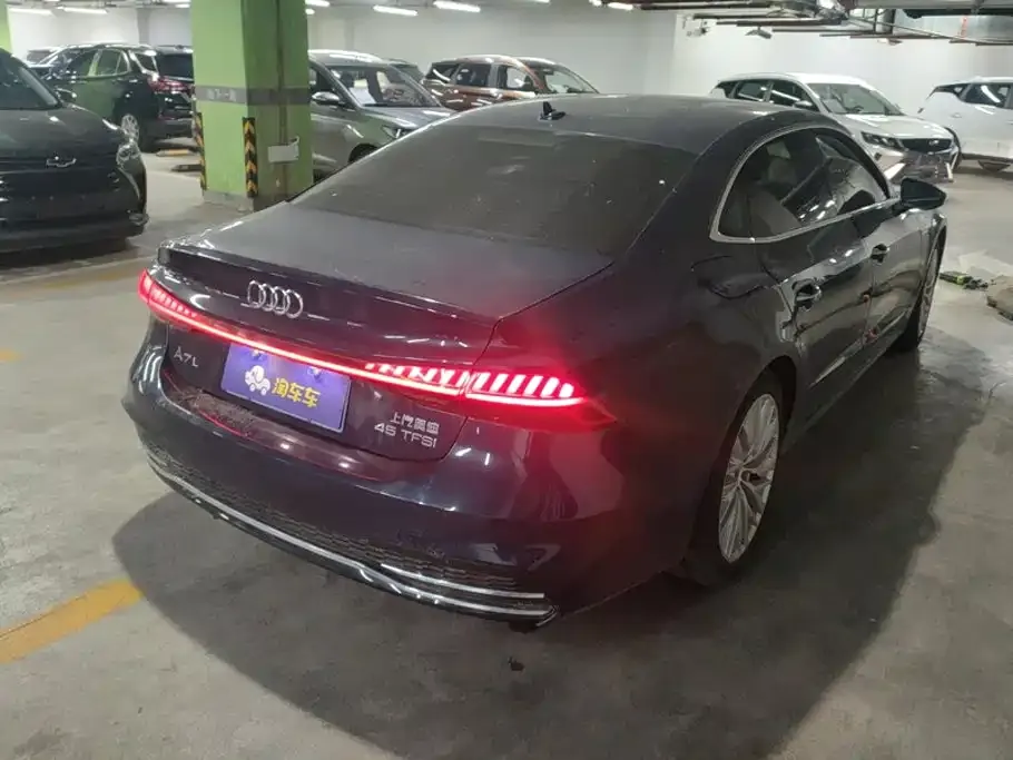 Audi A7L — фото 8