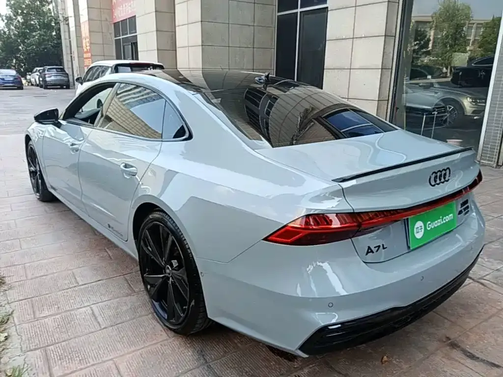 Audi A7L — фото 8