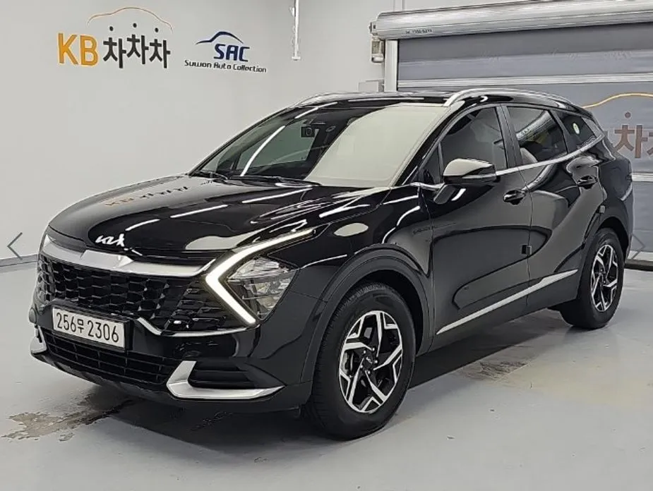 Kia Sportage — фото 1