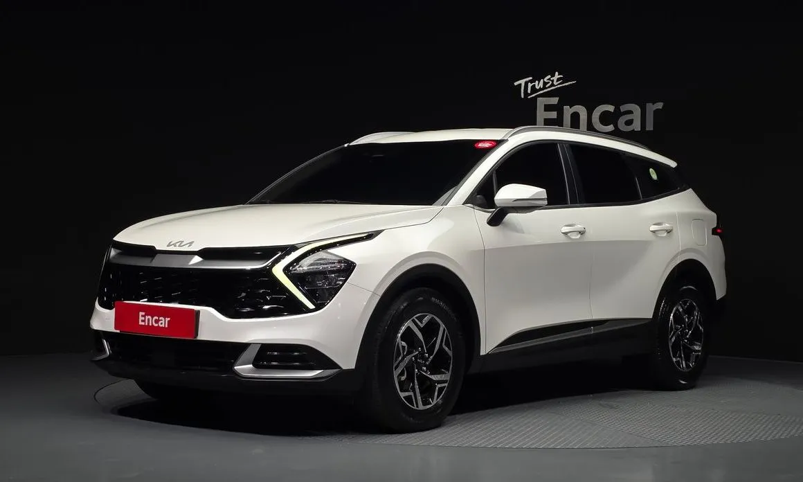 Kia Sportage — фото 1