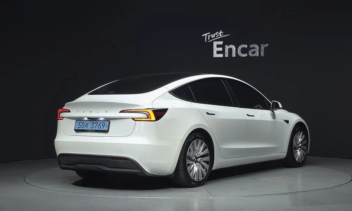 Tesla Model 3 — фото 10