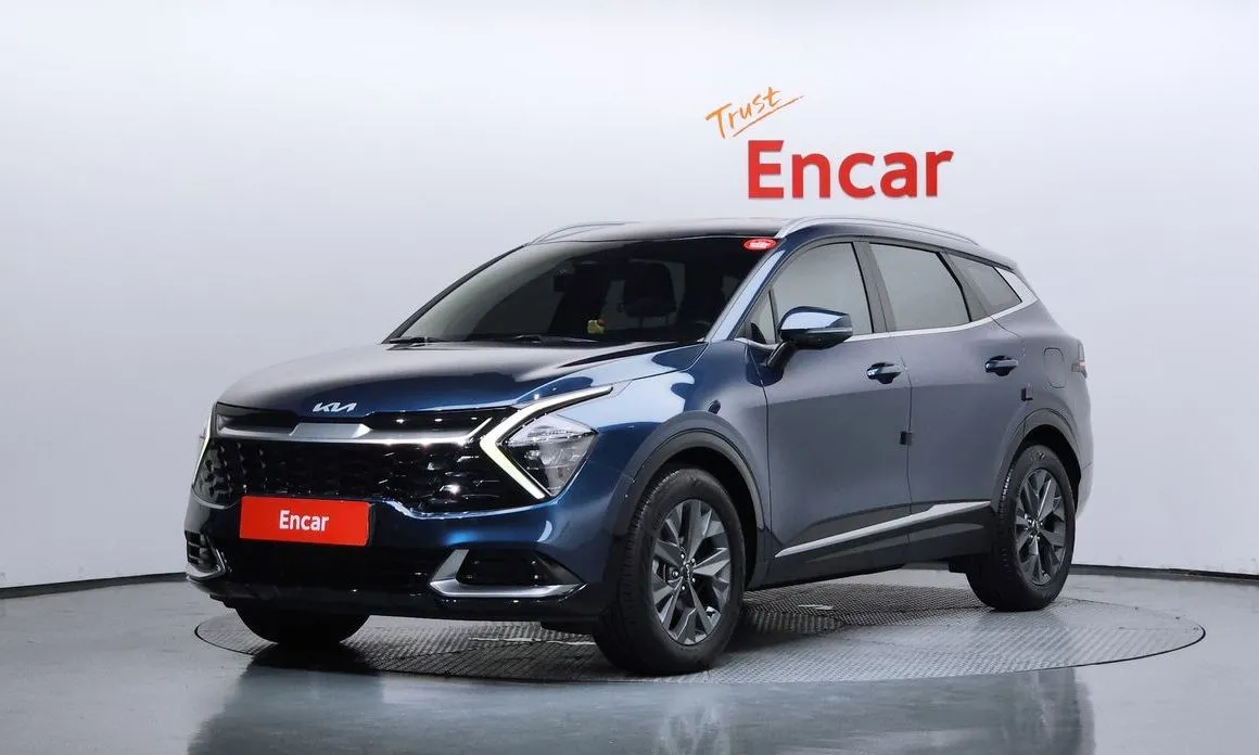 Kia Sportage — фото 1