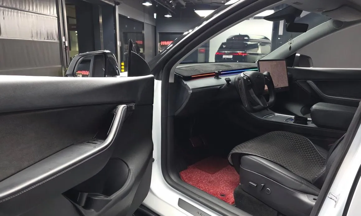 Tesla Model Y — фото 9