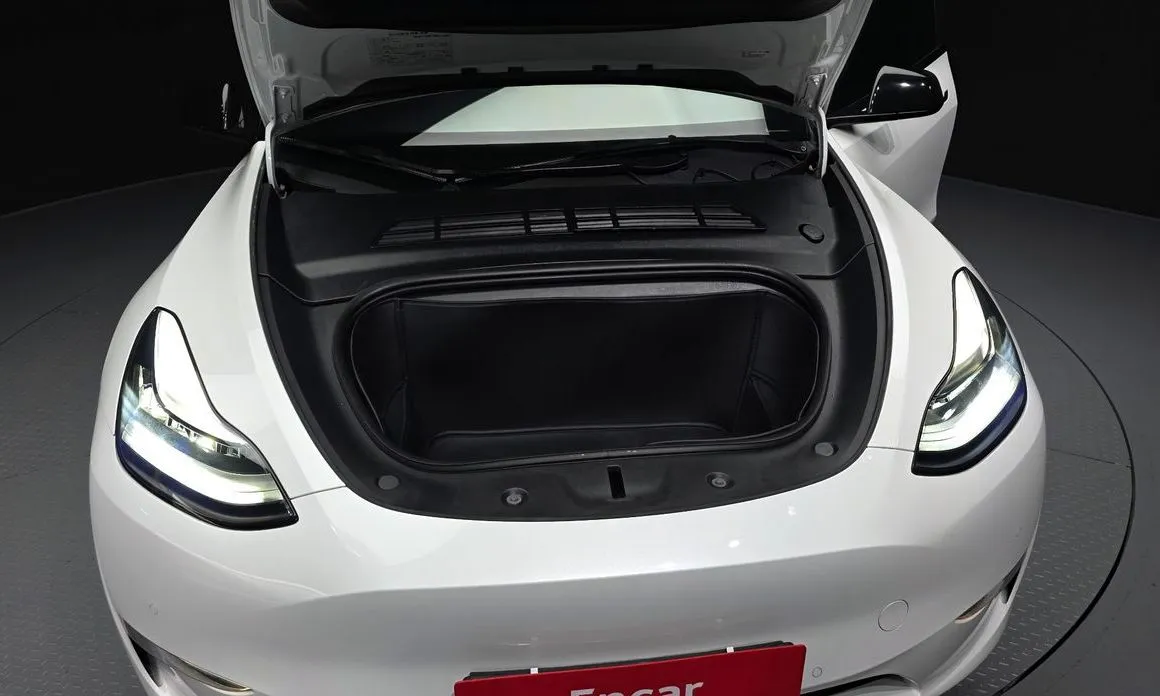 Tesla Model Y — фото 7