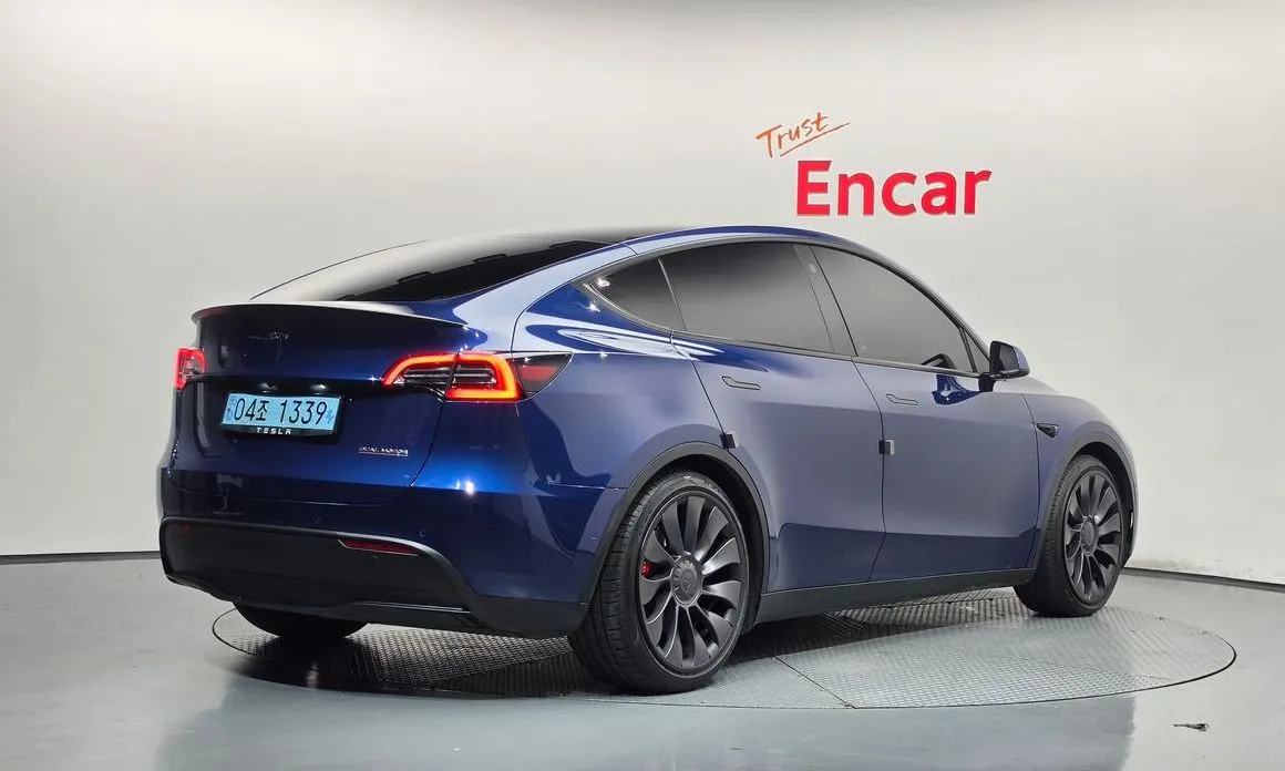 Tesla Model Y — фото 7