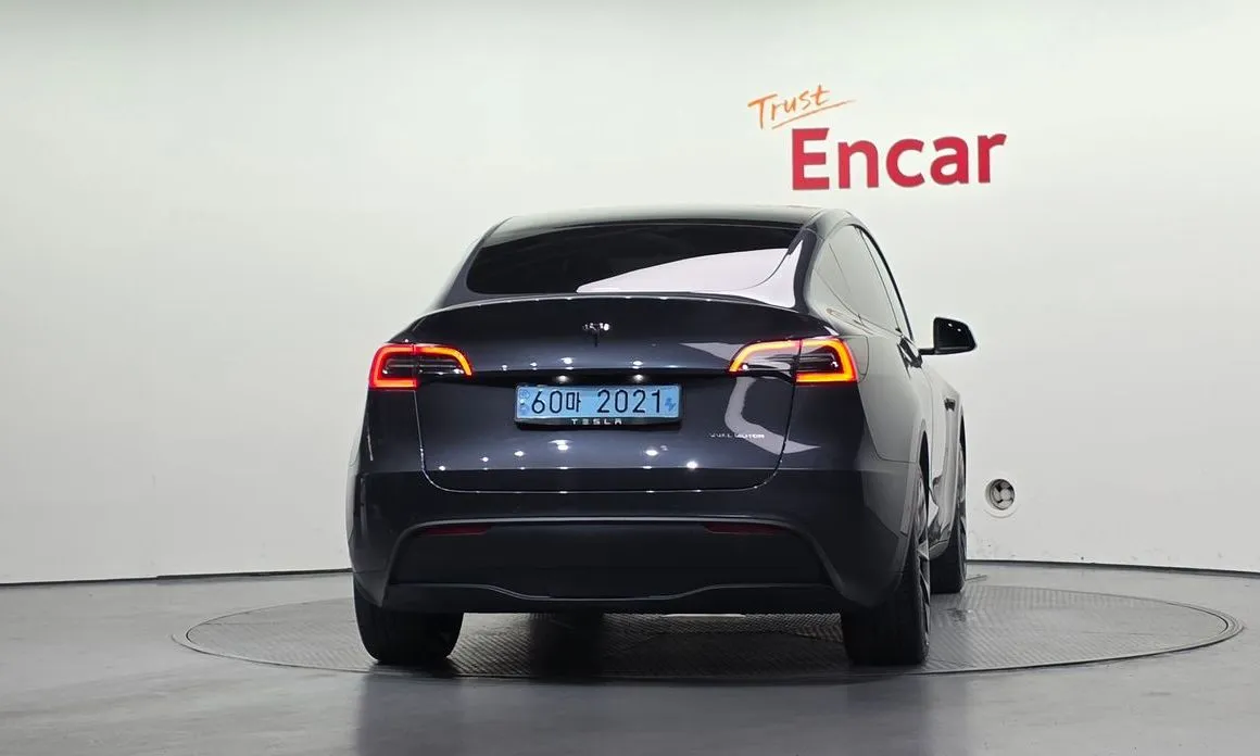 Tesla Model Y — фото 7