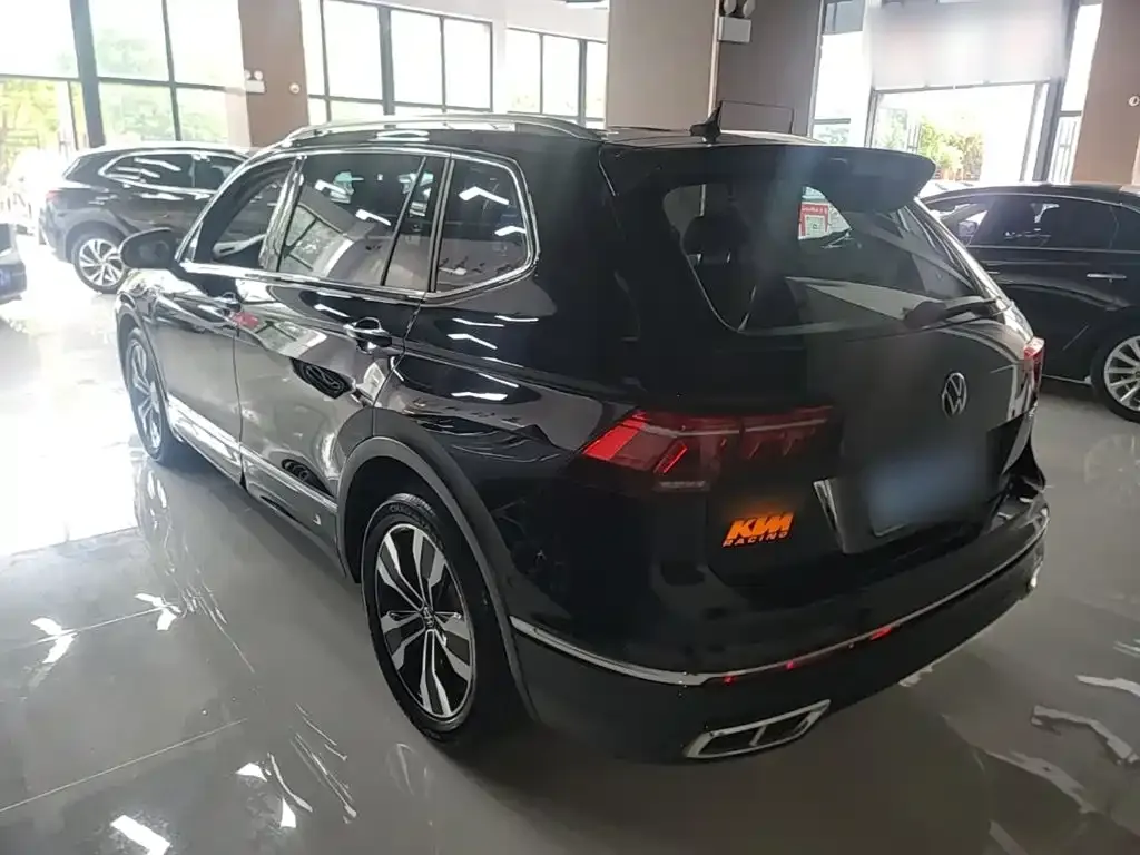 Volkswagen Tiguan L — фото 4