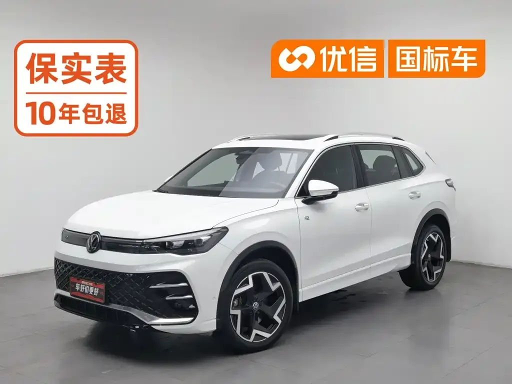 Volkswagen Tiguan L — фото 1