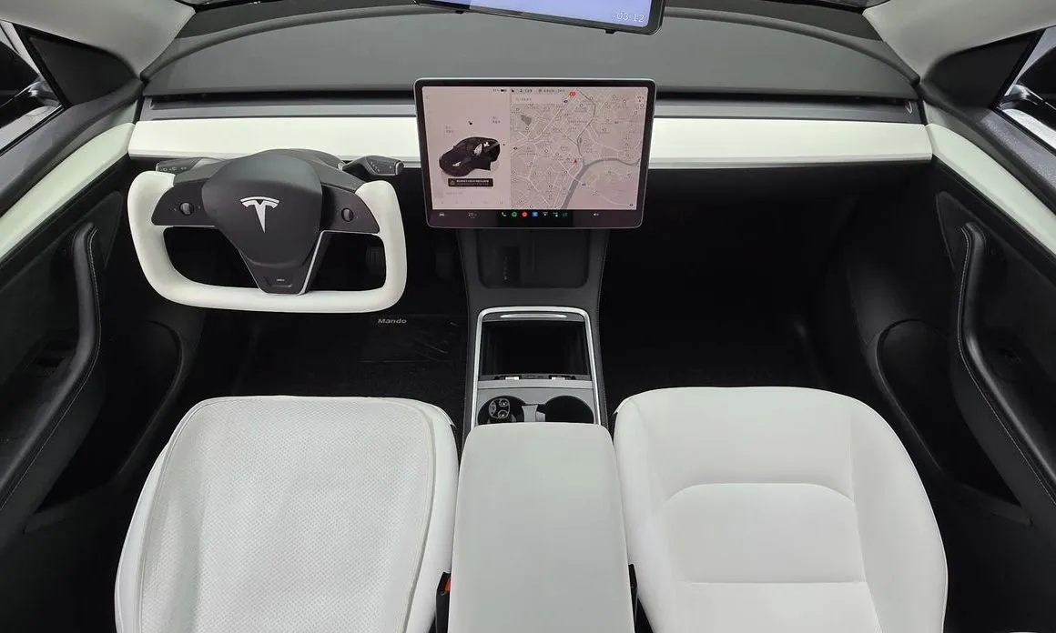 Tesla Model Y — фото 6