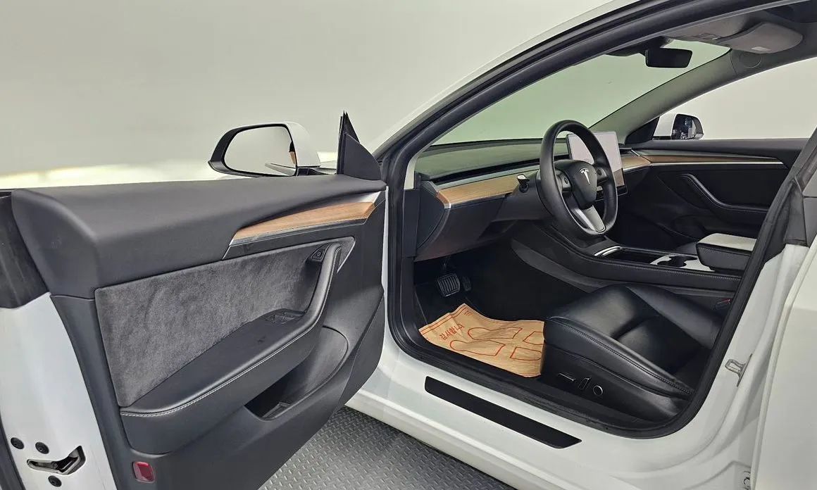 Tesla Model 3 — фото 10