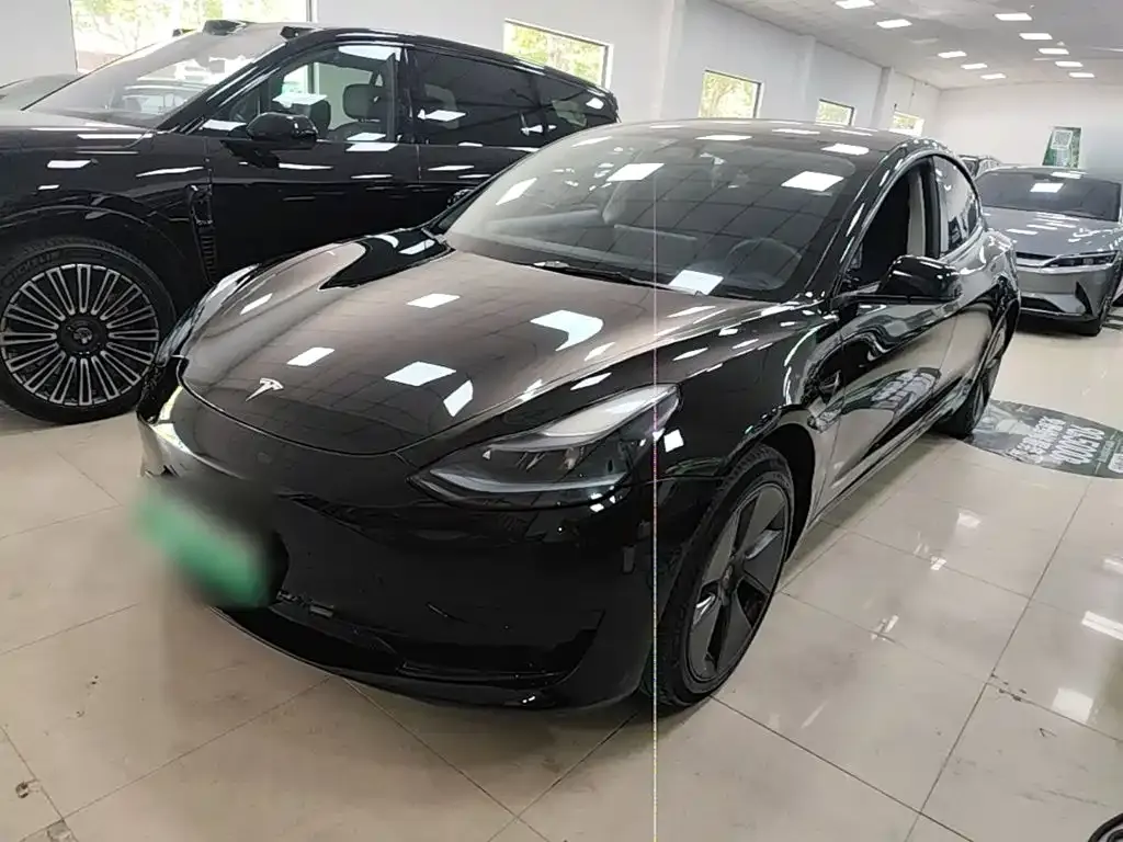 Tesla Model 3 — фото 9