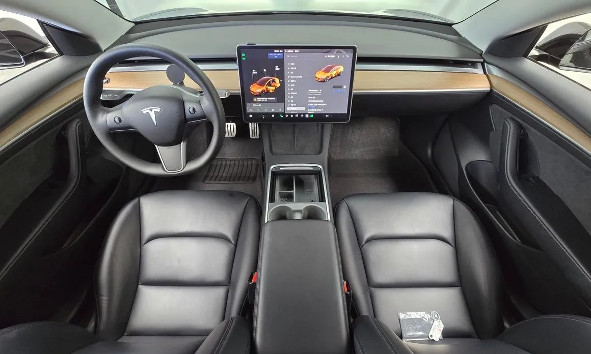 Tesla Model 3 — фото 10