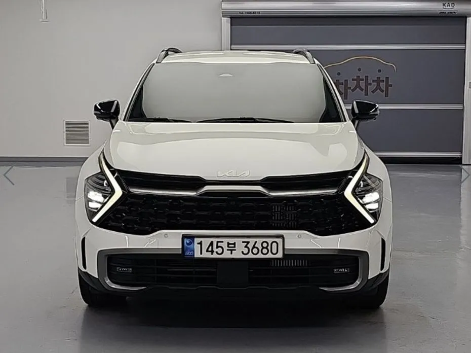 Kia Sportage — фото 1