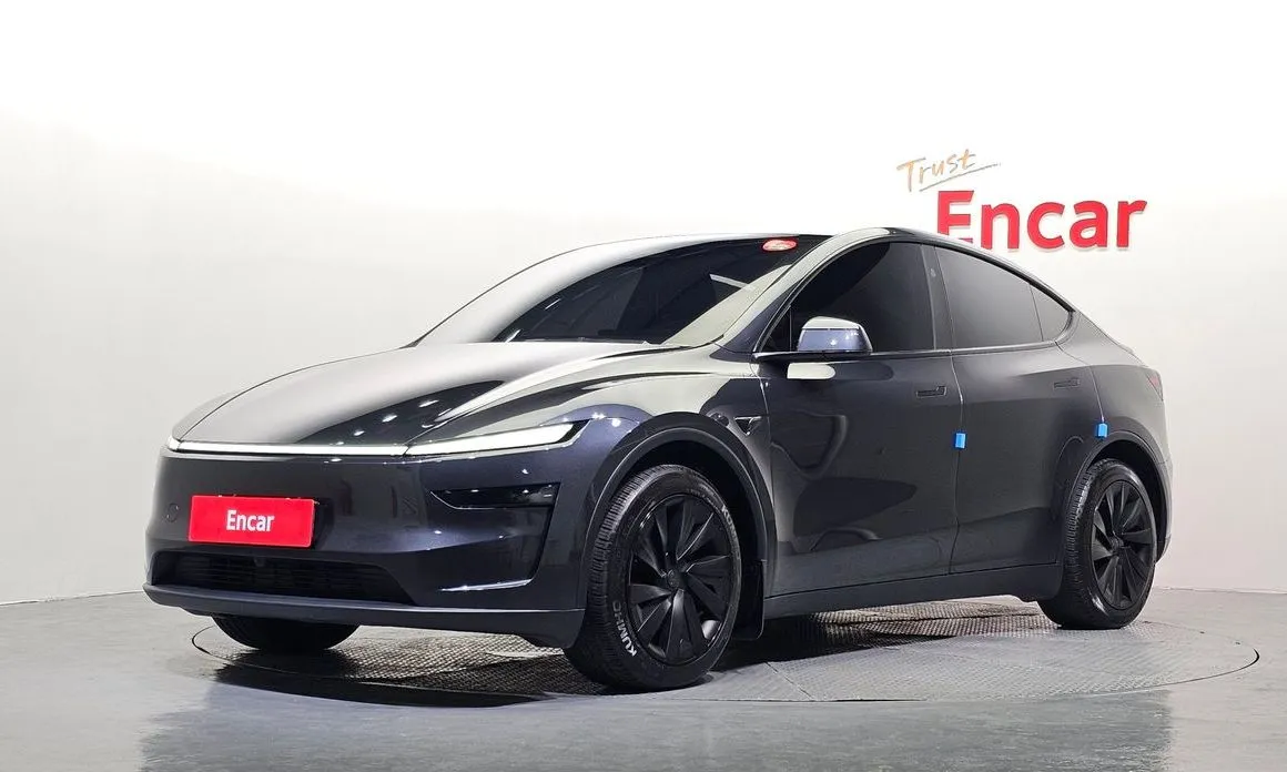 Tesla Model Y — фото 1