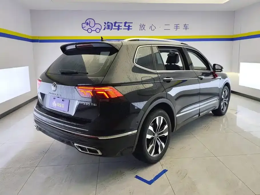 Volkswagen Tiguan L — фото 10