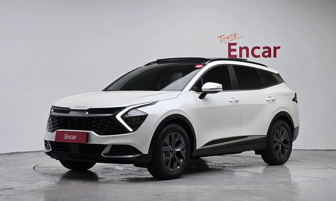 Kia Sportage — фото 1