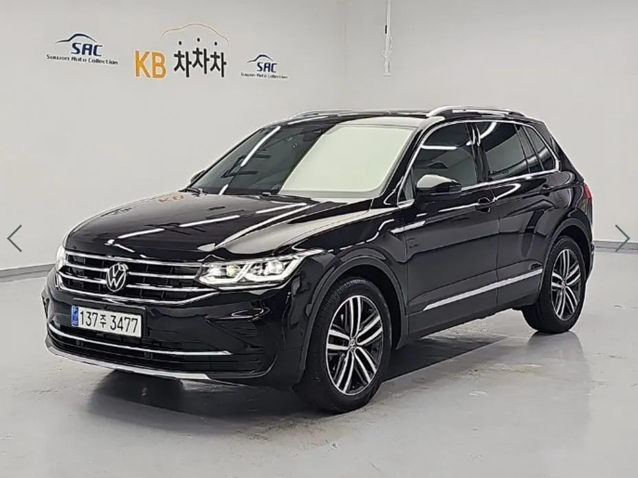 Volkswagen Tiguan — фото 1