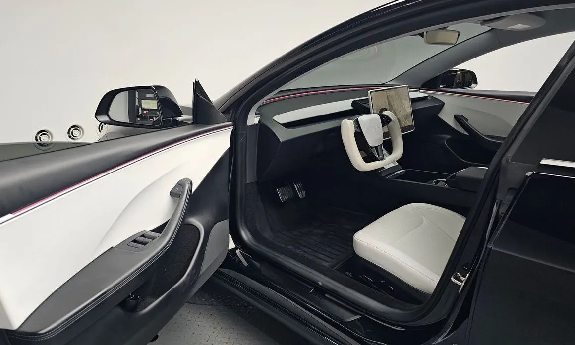 Tesla Model 3 — фото 10