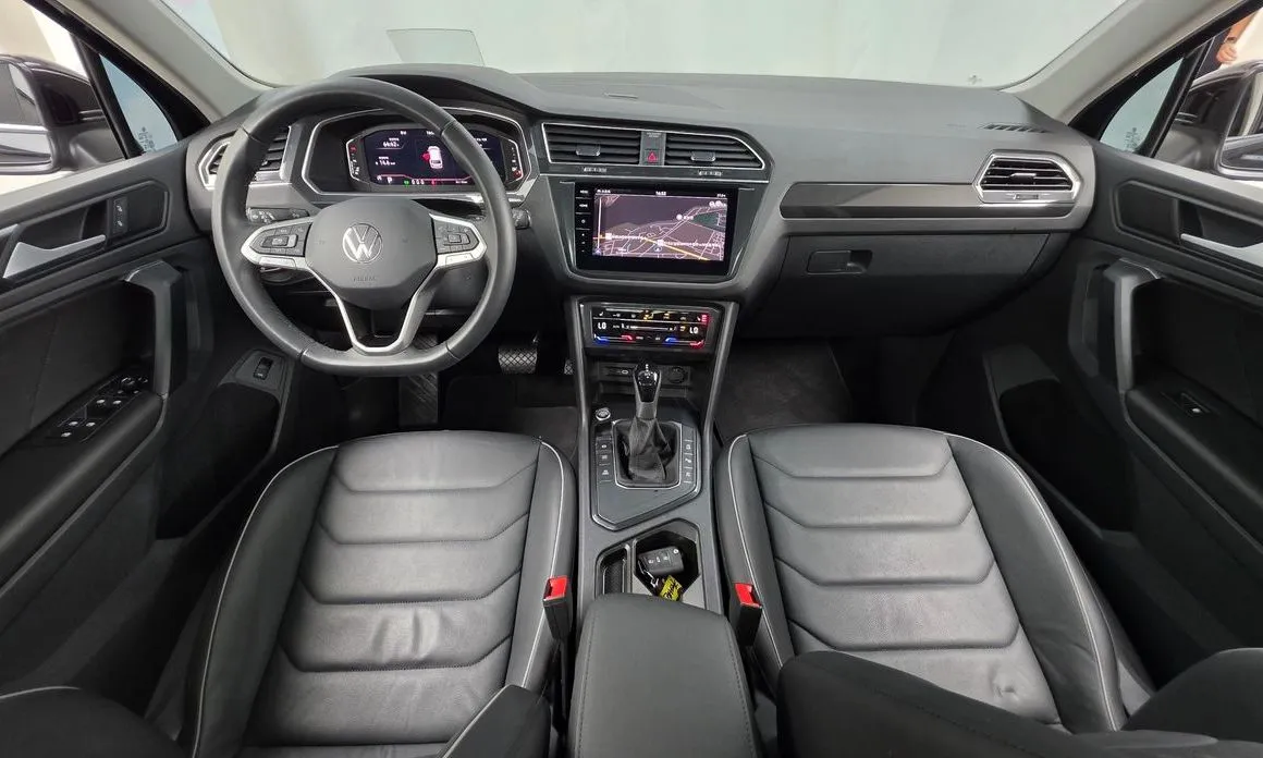 Volkswagen Tiguan — фото 6