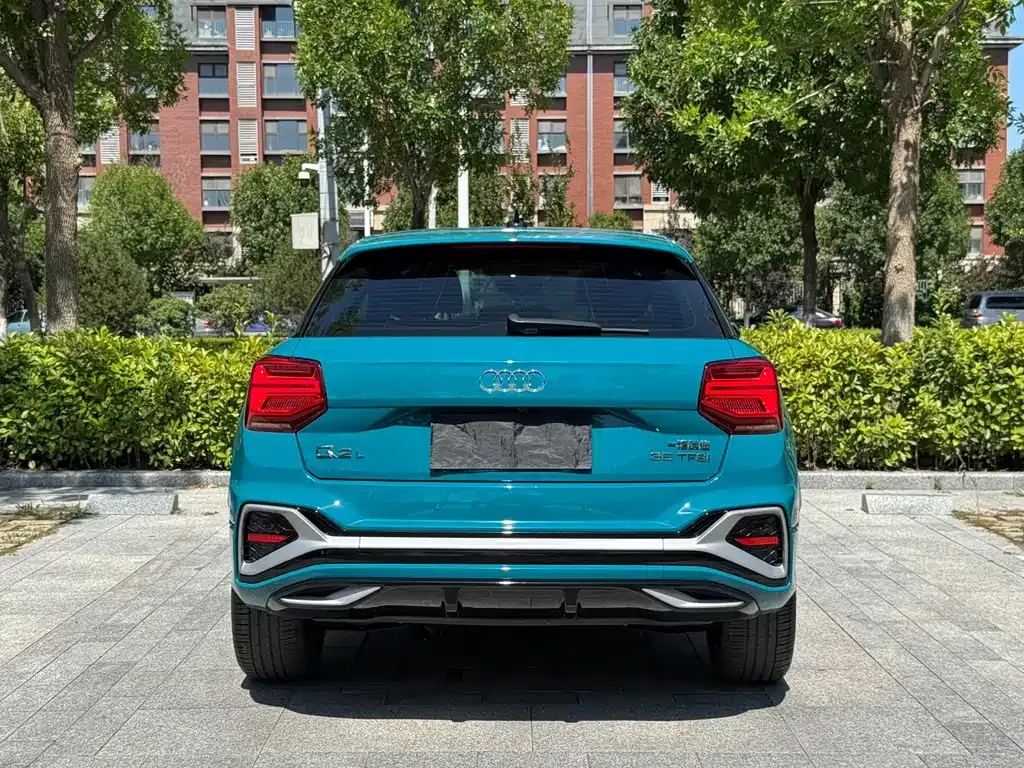 Audi Q2L — фото 7