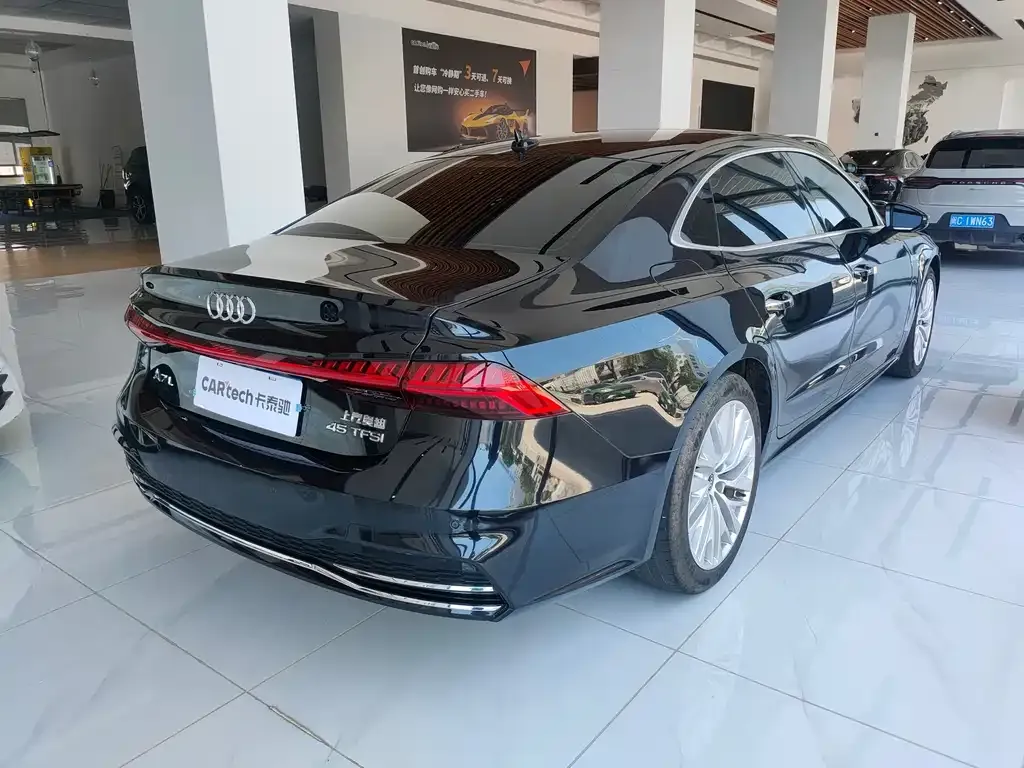 Audi A7L — фото 7