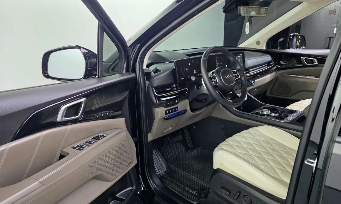 Kia Carnival — фото 10