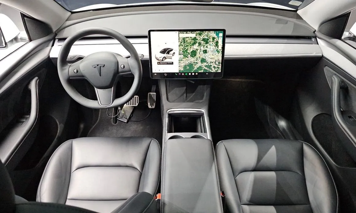 Tesla Model Y — фото 8
