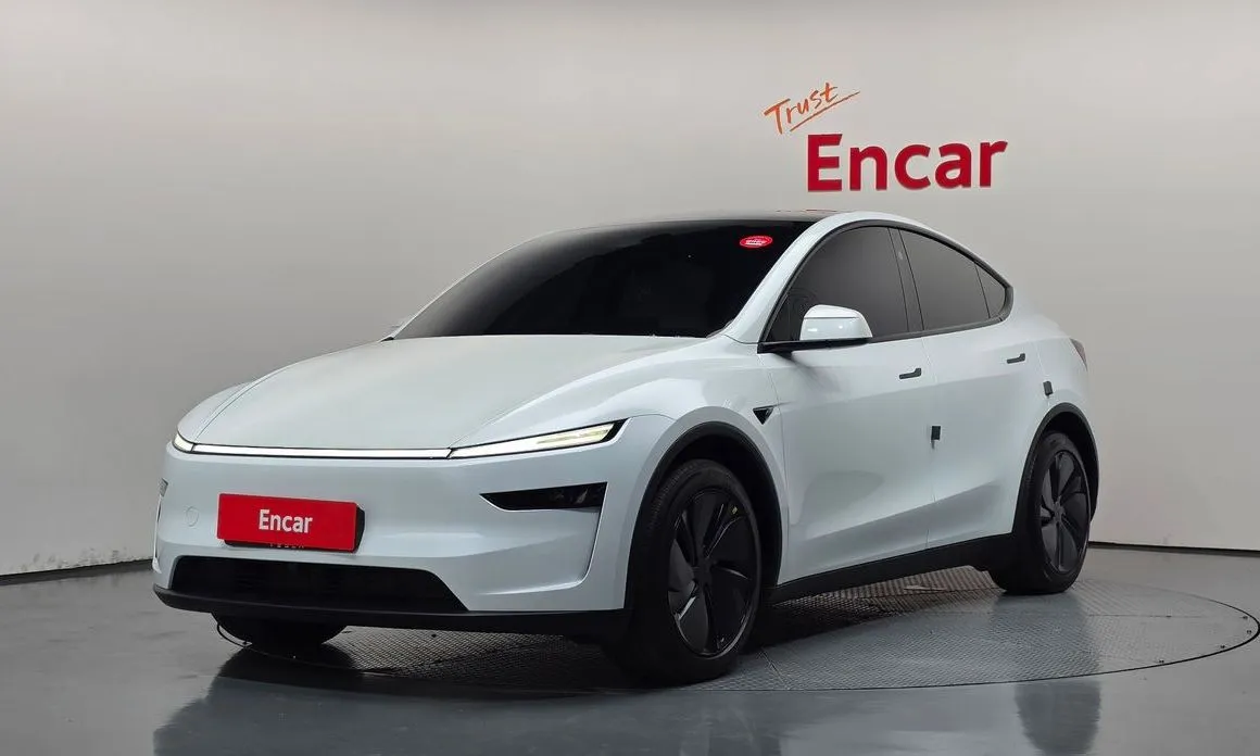 Tesla Model Y — фото 1