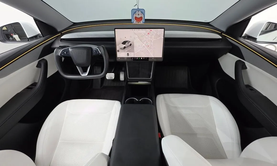 Tesla Model Y — фото 9