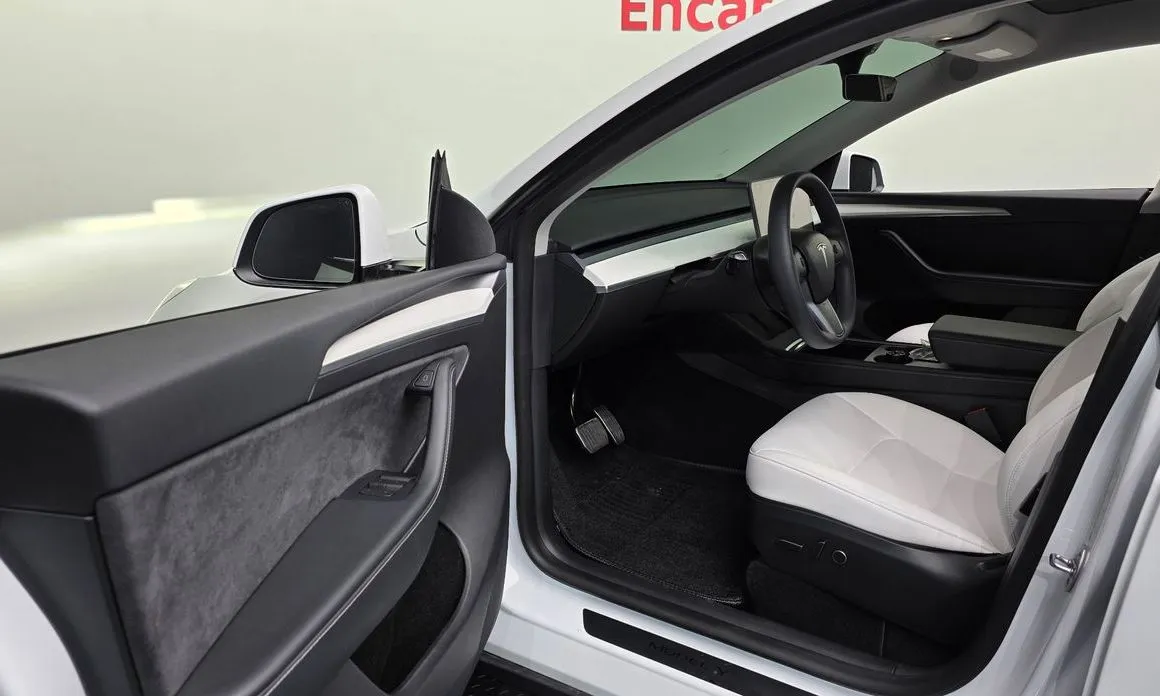 Tesla Model Y — фото 9