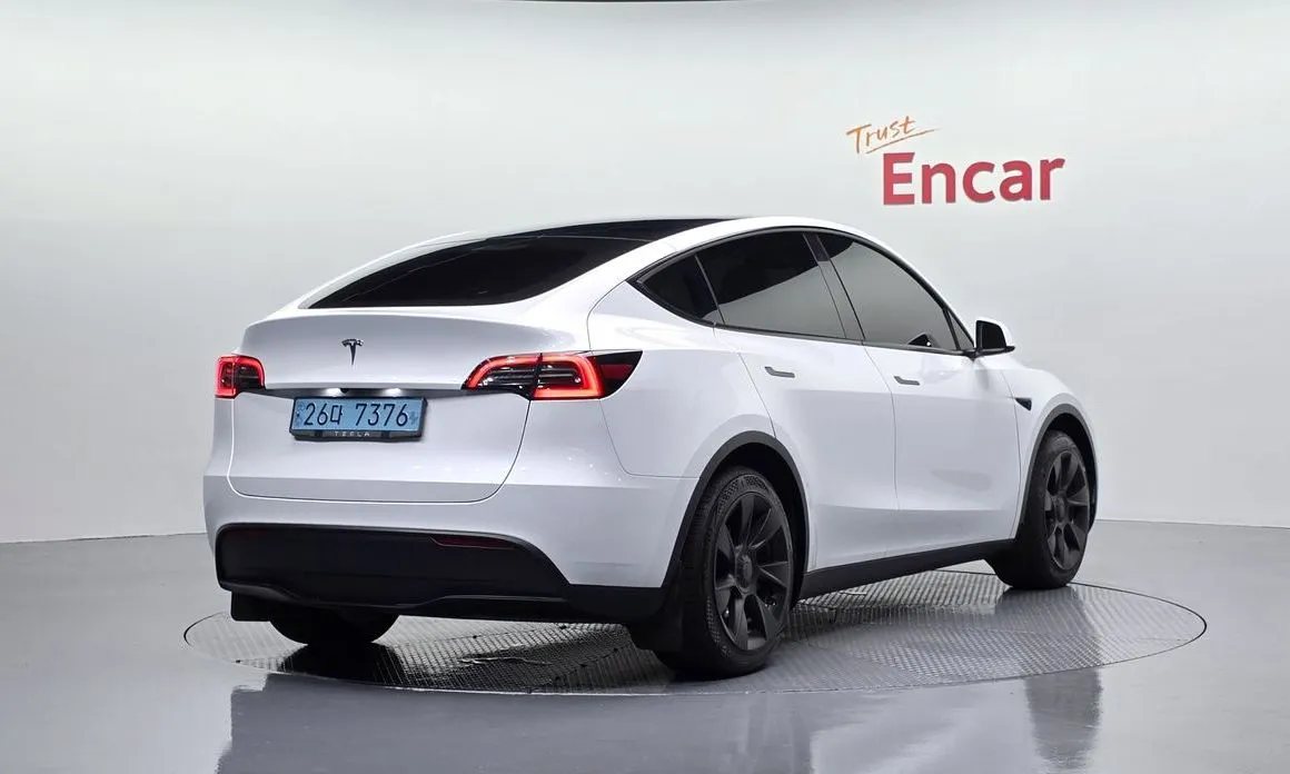 Tesla Model Y — фото 7