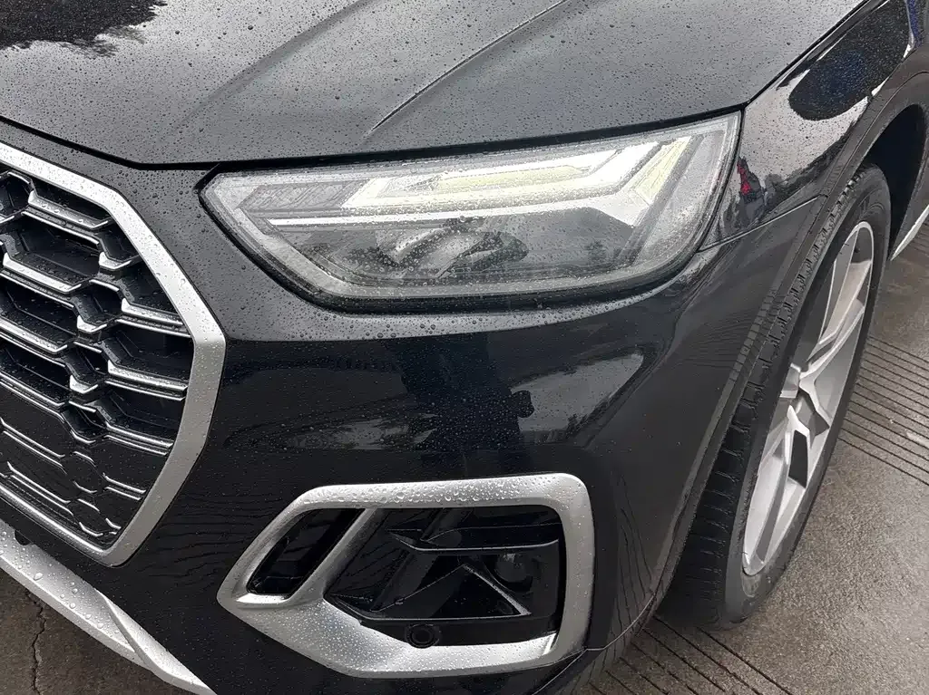 Audi Q5L — фото 10