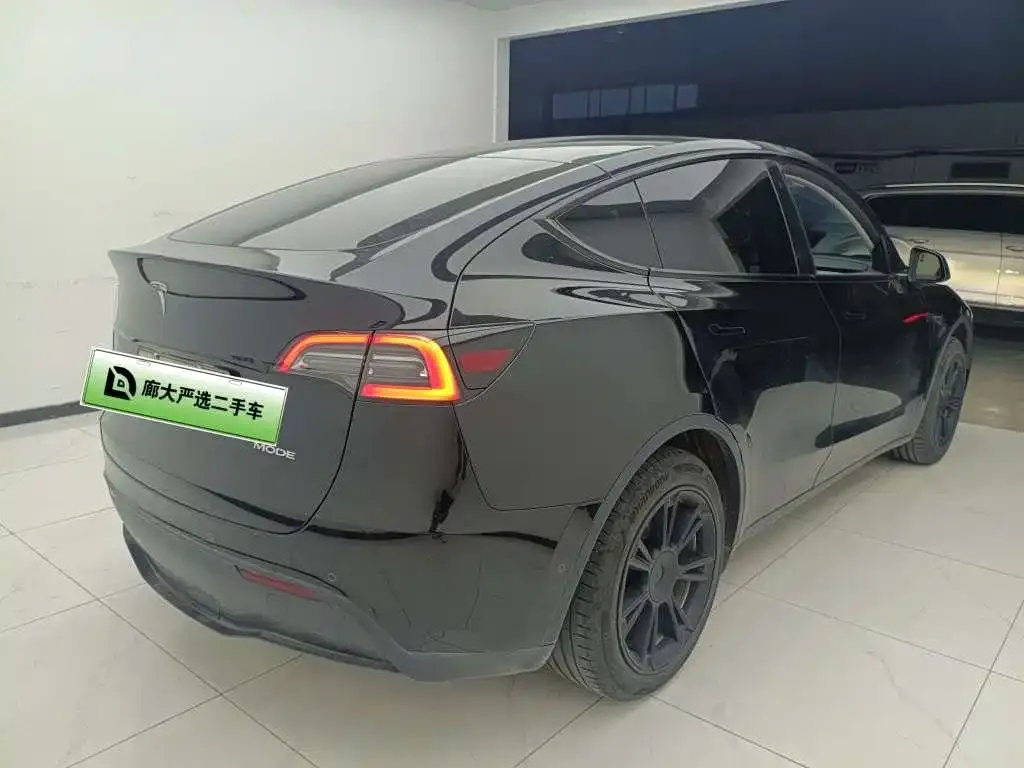 Tesla Model Y — фото 5