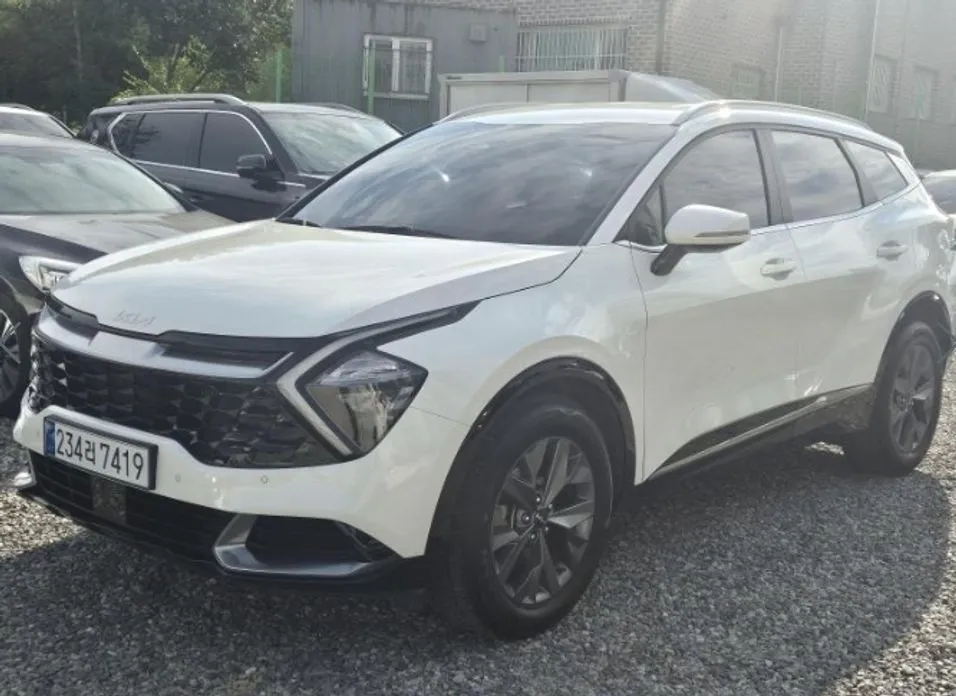 Kia Sportage — фото 1